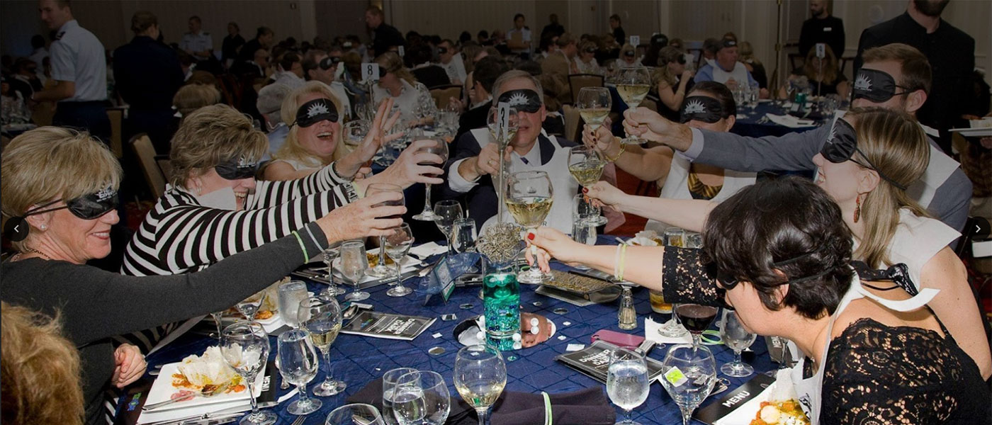 people toasting at dinner