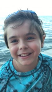 Creed 4 days after his first surgery to reduce his vision loss caused by LCA-RPE65. He is smiling at the camera, because he can see the camera.