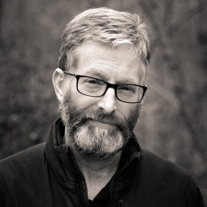 image: bearded mad with glasses