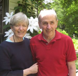 Smiling woman and man posing together