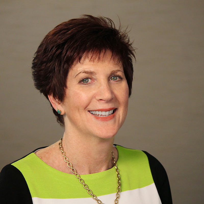head shot of smiling woman